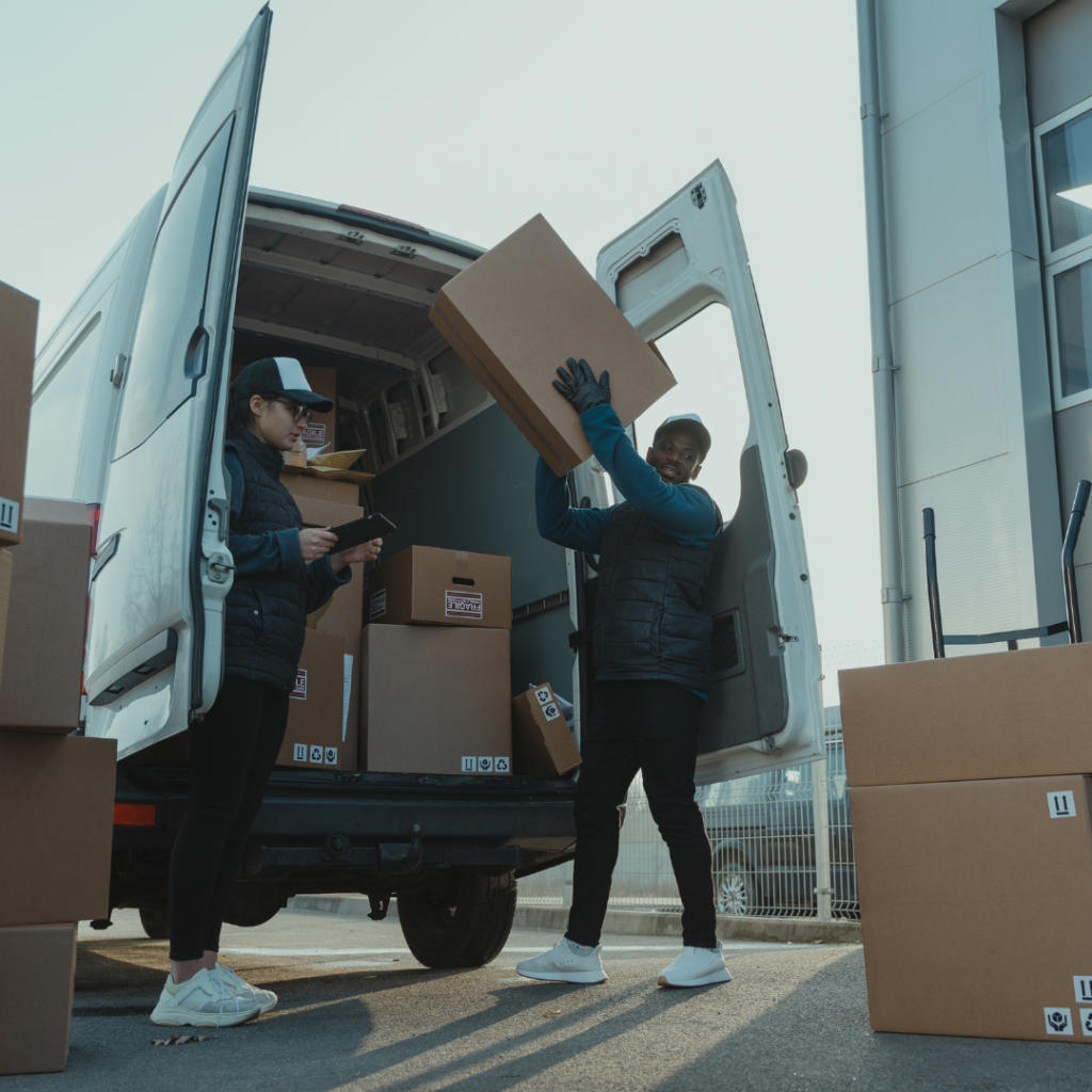 This is a picture of a two-person team with packed goods to demonstrate Is Automated Packing Only for Big Businesses? Think Again