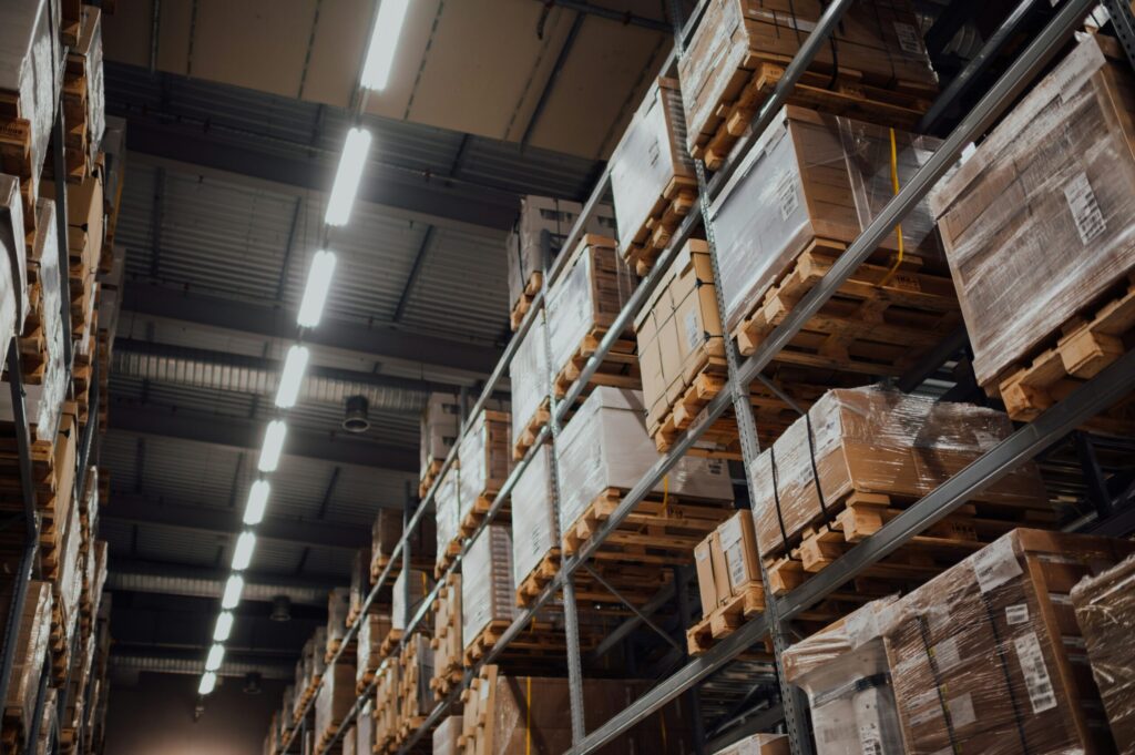 This is a photo of stacked pallets of packed products to show Contract Packing Partner: What to Check Before You Outsource