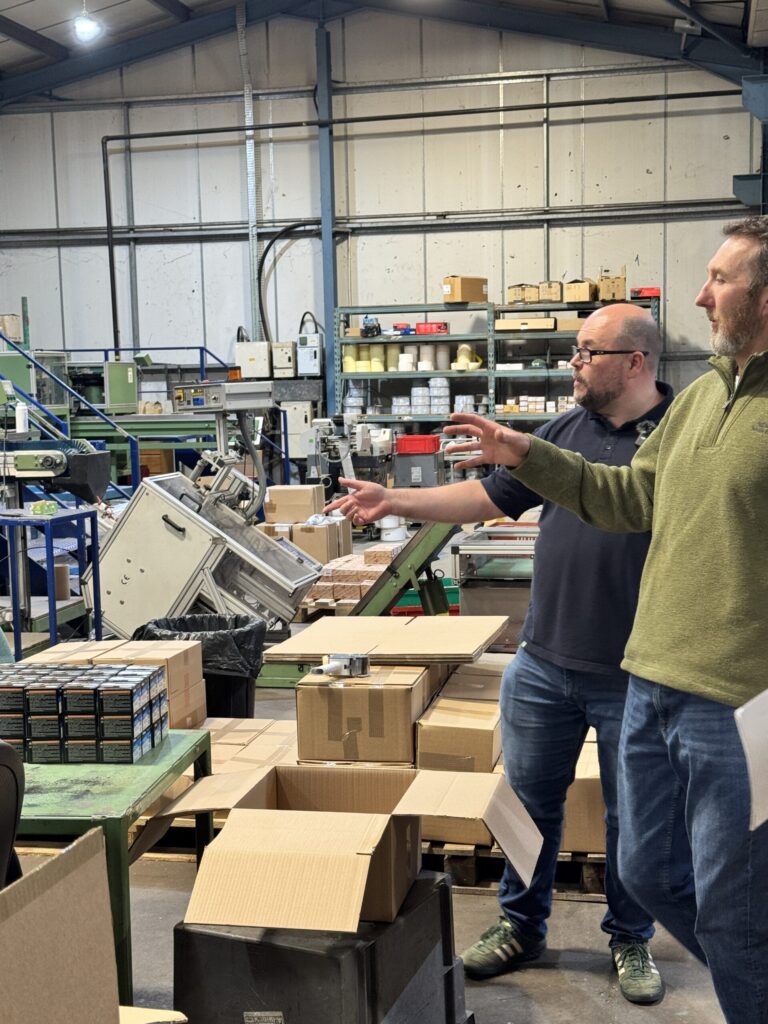 This is a picture of a business meeting at Excel Contract Packing to show 'The Biggest Packing Problems Manufacturers Bring To Excel, And How We Fix Them'
